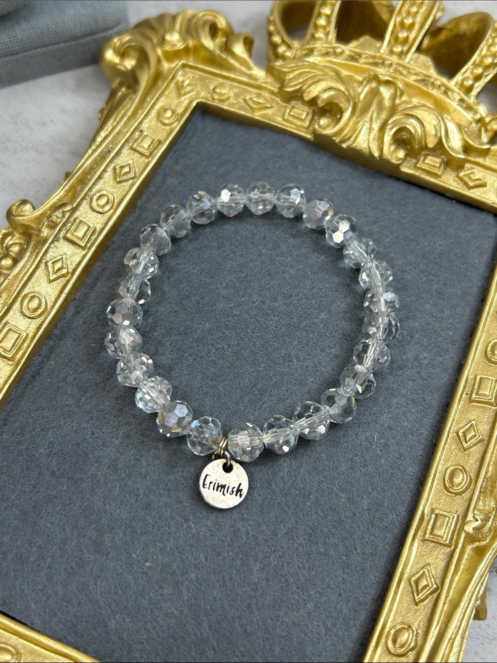 Erimish Silver Clear Faceted Crystal Stretch Bracelet with Logo Charm